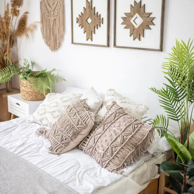 Bohemian Bedroom Decor Cozy bohemian bedroom with decorative pillows and wall art