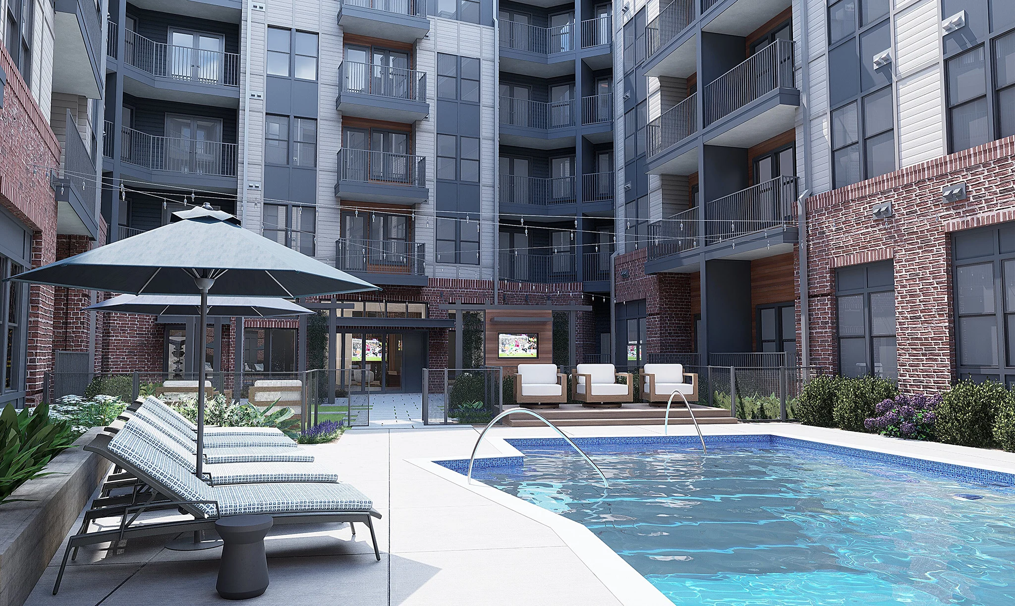A modern apartment complex featuring a swimming pool surrounded by lounge chairs and umbrellas, with a courtyard view of the building's exterior.