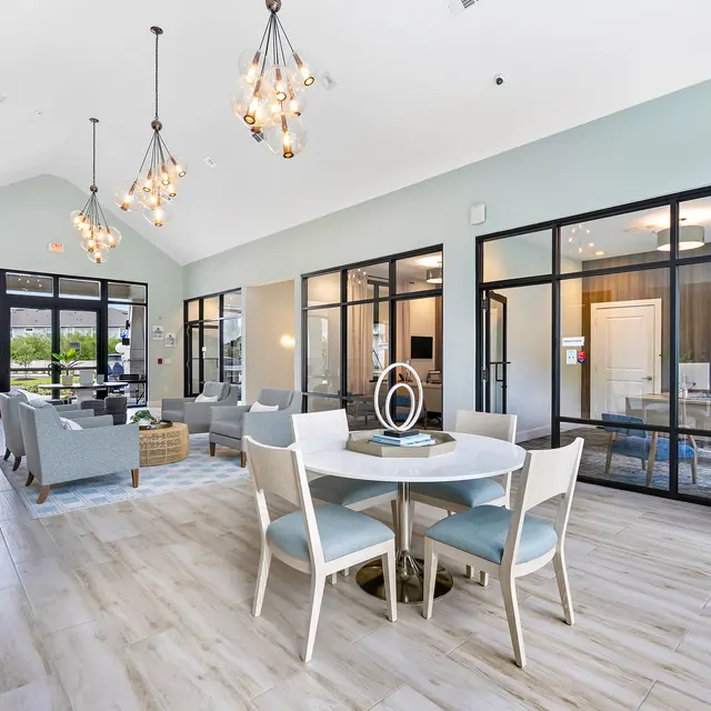 Stylish Modern Living Space A modern living area with a dining table and lounge seating.