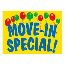 A colorful sign featuring the words 'MOVE-IN SPECIAL!' in large blue letters on a bright yellow background, accompanied by balloons in red, green, and yellow.