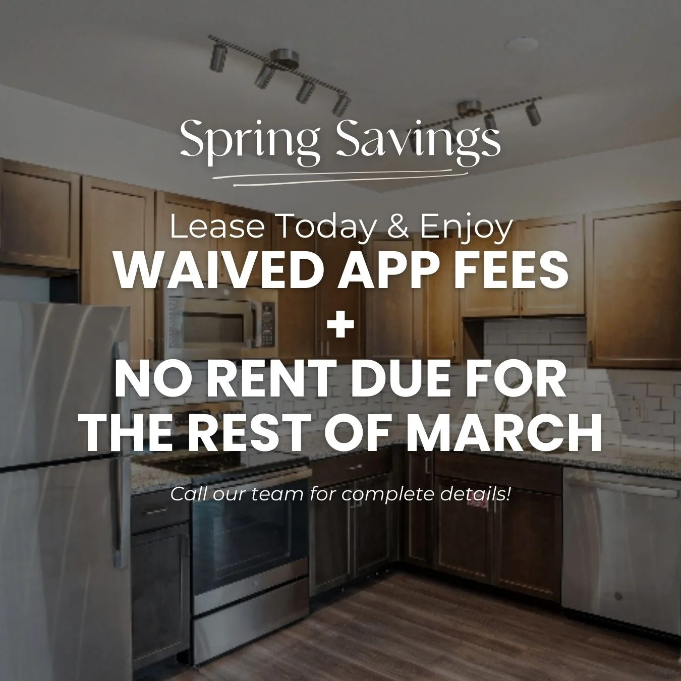 Promotional image for leasing apartment with kitchen view and text about waived application fees and no rent due for March.
