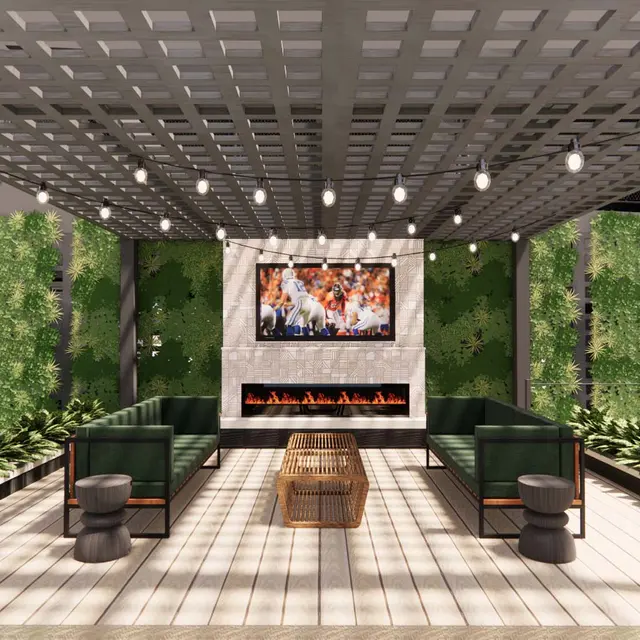 Chic Outdoor Lounge Space A stylish outdoor lounge area featuring a seating arrangement under a trellis, with string lights, a fireplace, and a TV on a decorated wall surrounded by greenery.