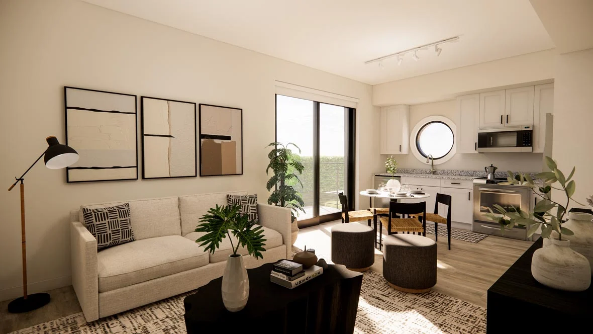 A modern living room with a beige sofa, a round window, a small dining area, and stylish decor.