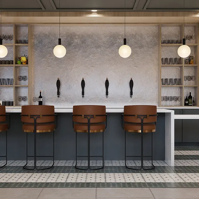 Modern Bar Interior Design Contemporary bar area featuring a sleek design with a light wood backdrop, round pendant lights, and modern bar stools.