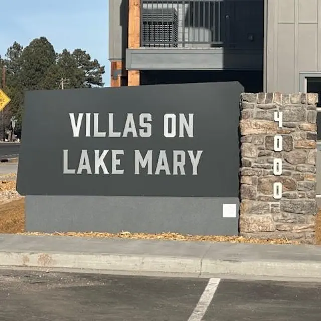 Villas on Lake Mary Sign Sign for Villas on Lake Mary, displaying the name and address 4000.