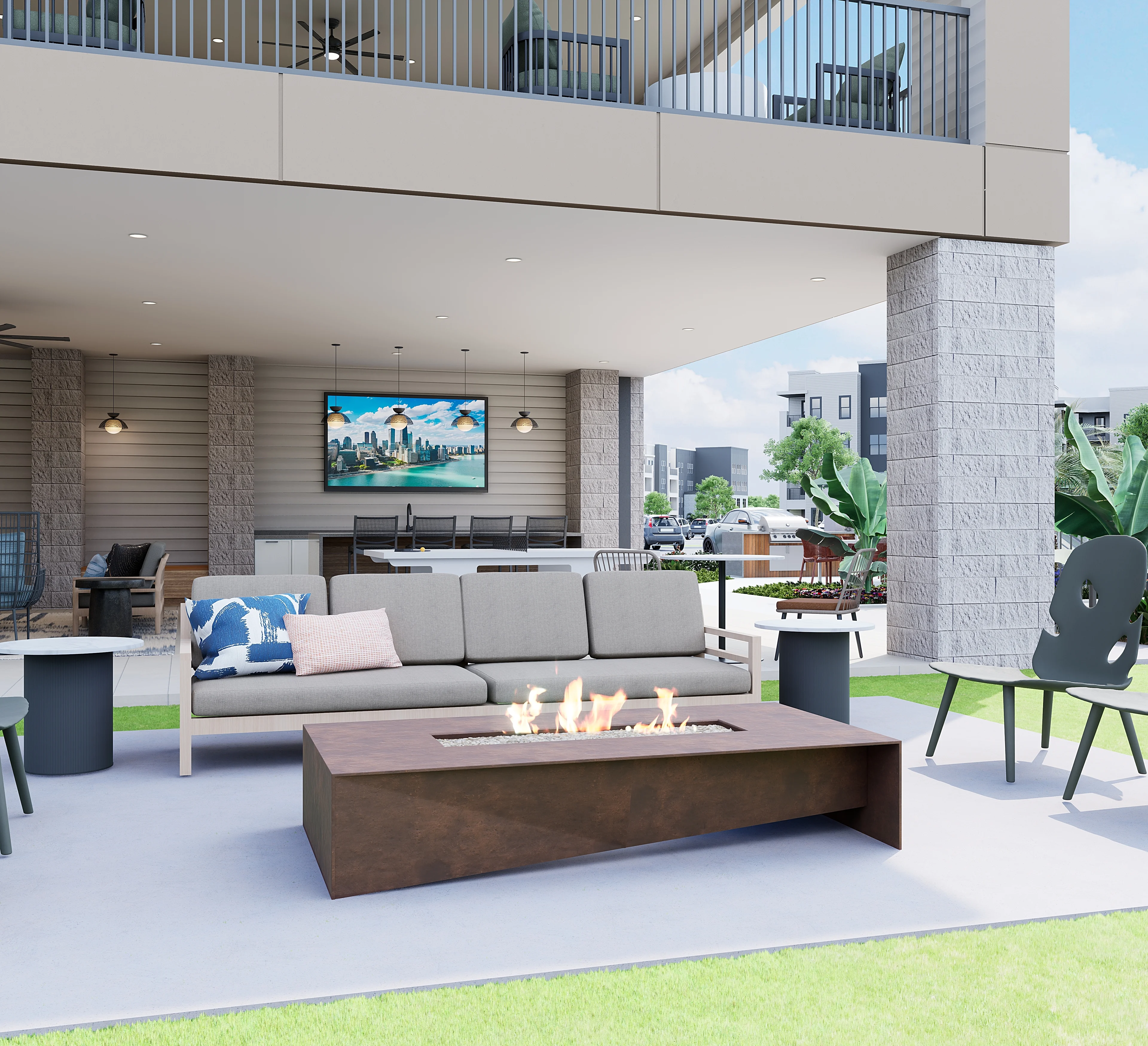 Elegant Outdoor Living Space A modern outdoor living space featuring a seating area with a sofa and fire pit, under a covered patio with plants and an outdoor television.