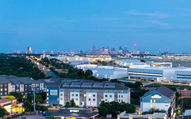 Apartment Location | City skyline view at dusk