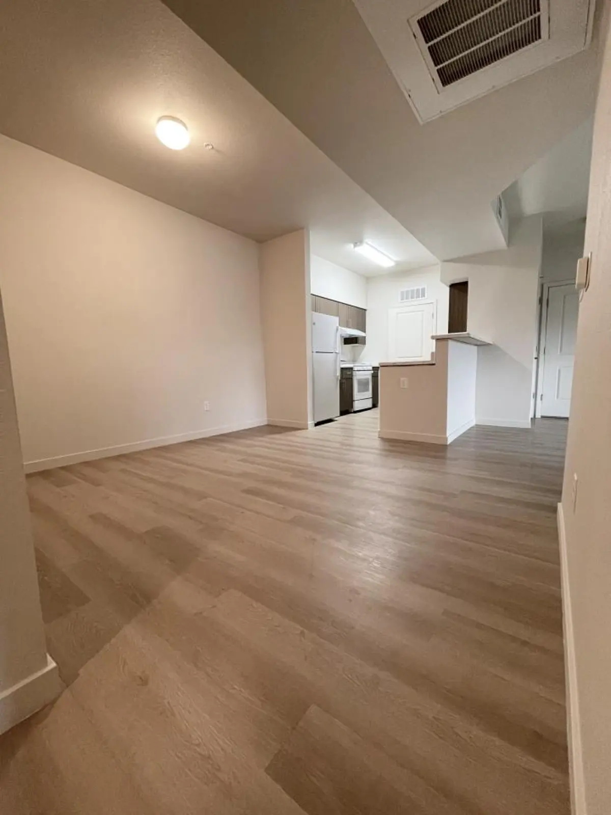 Open living room toward kitchen.
