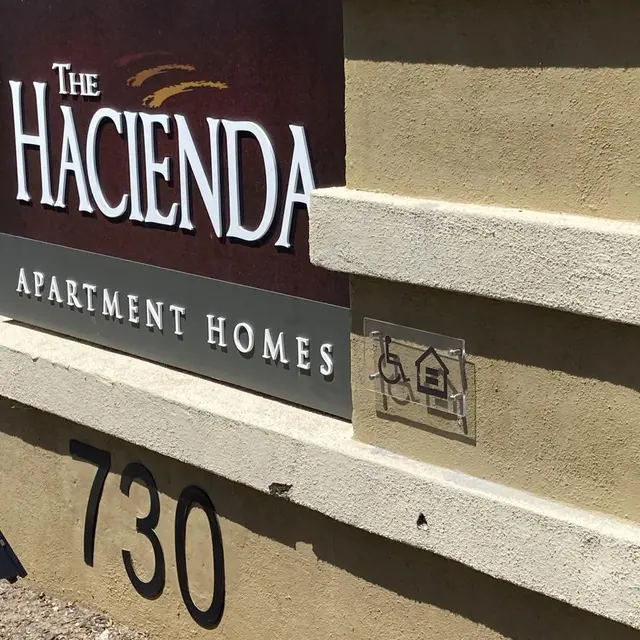 The Hacienda Apartment Homes Signage Sign for The Hacienda Apartment Homes, displaying the address '730'