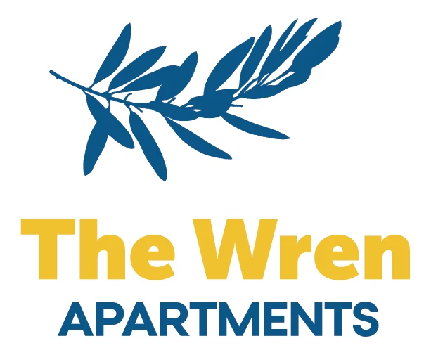 Logo design featuring an olive branch above the text 'The Wren Apartments' in two-tone colors