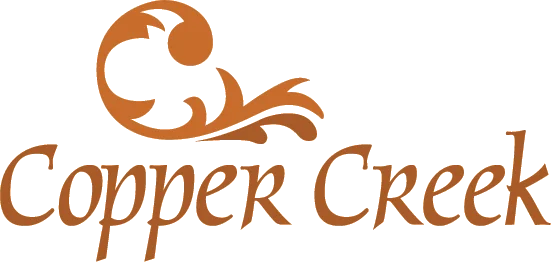 Copper Creek Logo Logo for Copper Creek featuring stylized text and design elements in orange.