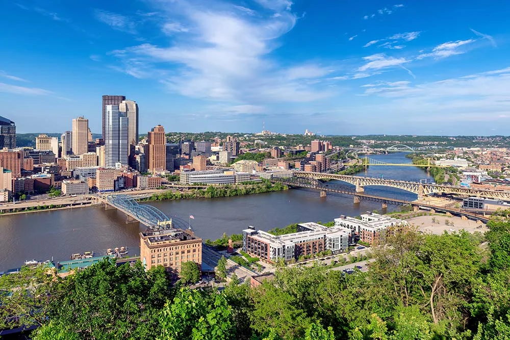 Pittsburgh Skyline Near Oak Hill Apartments Downtown Pittsburgh skyline and bridges viewed from Mount Washington near Oak Hill Apartments in Pittsburgh, Pennsylvania