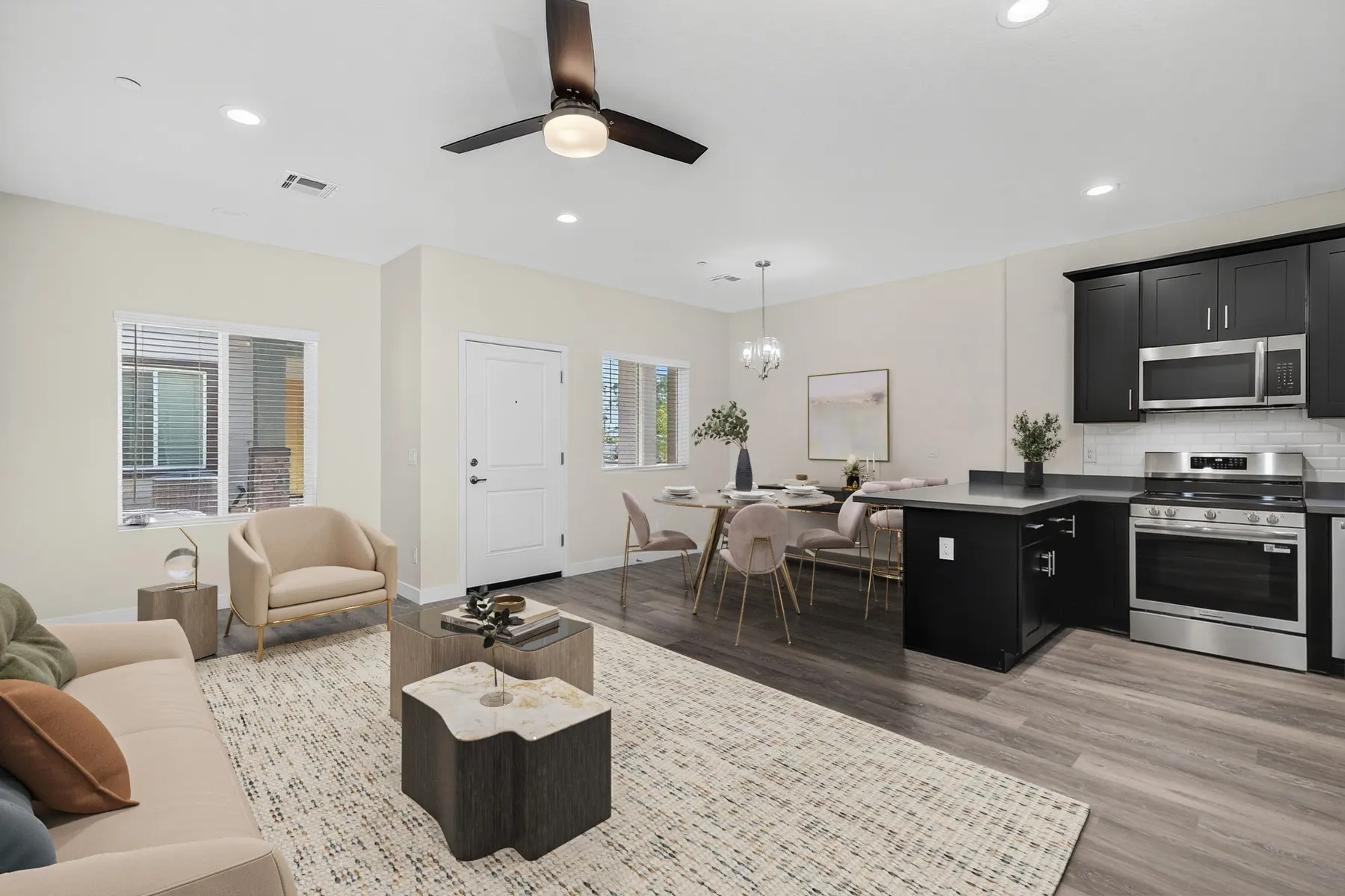 Furnished apartment living area shown — representative home at South Mountain Shadows.