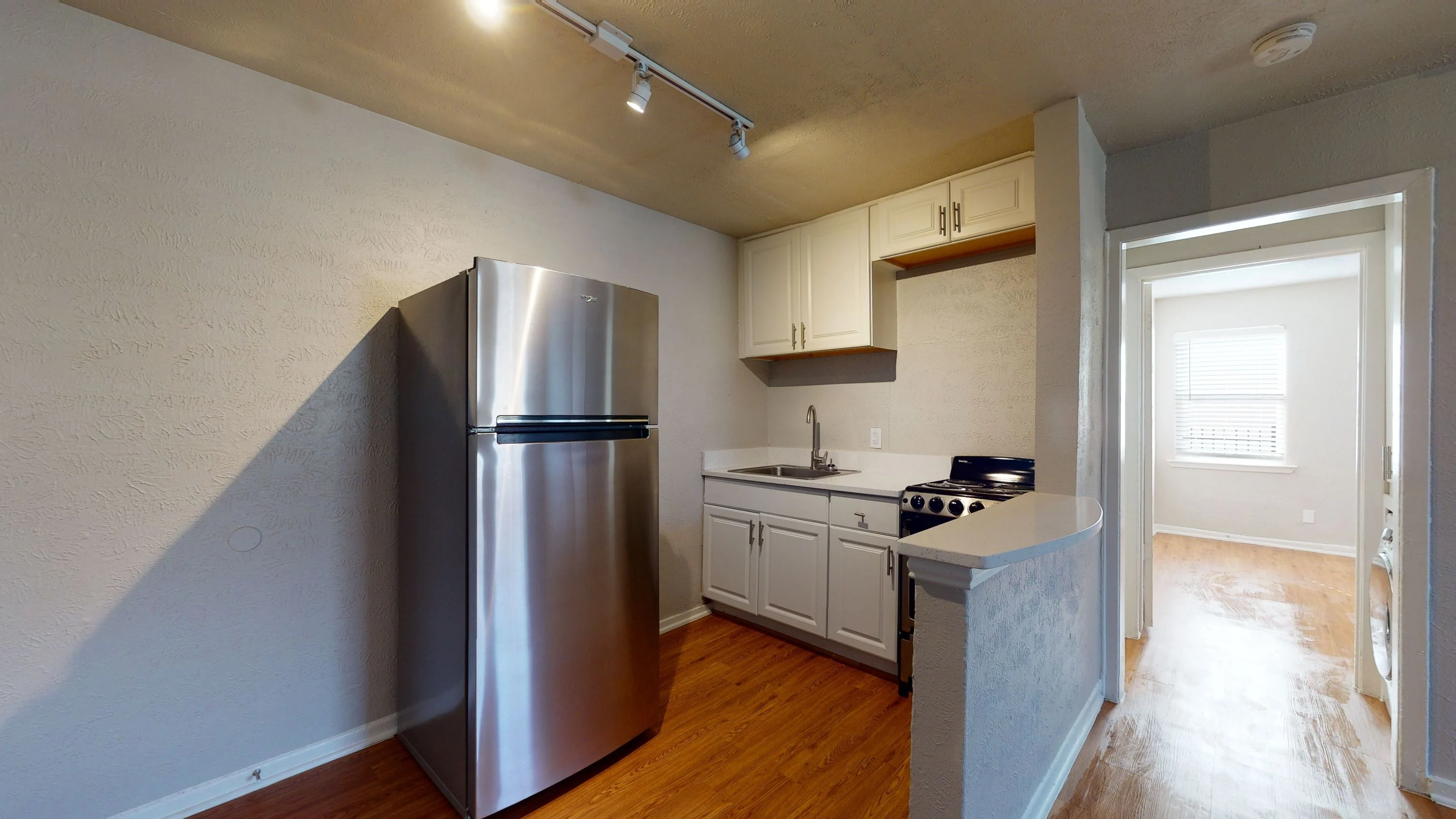 Caracara Apartments Caracara Apartments - Flooring, Wood, Room