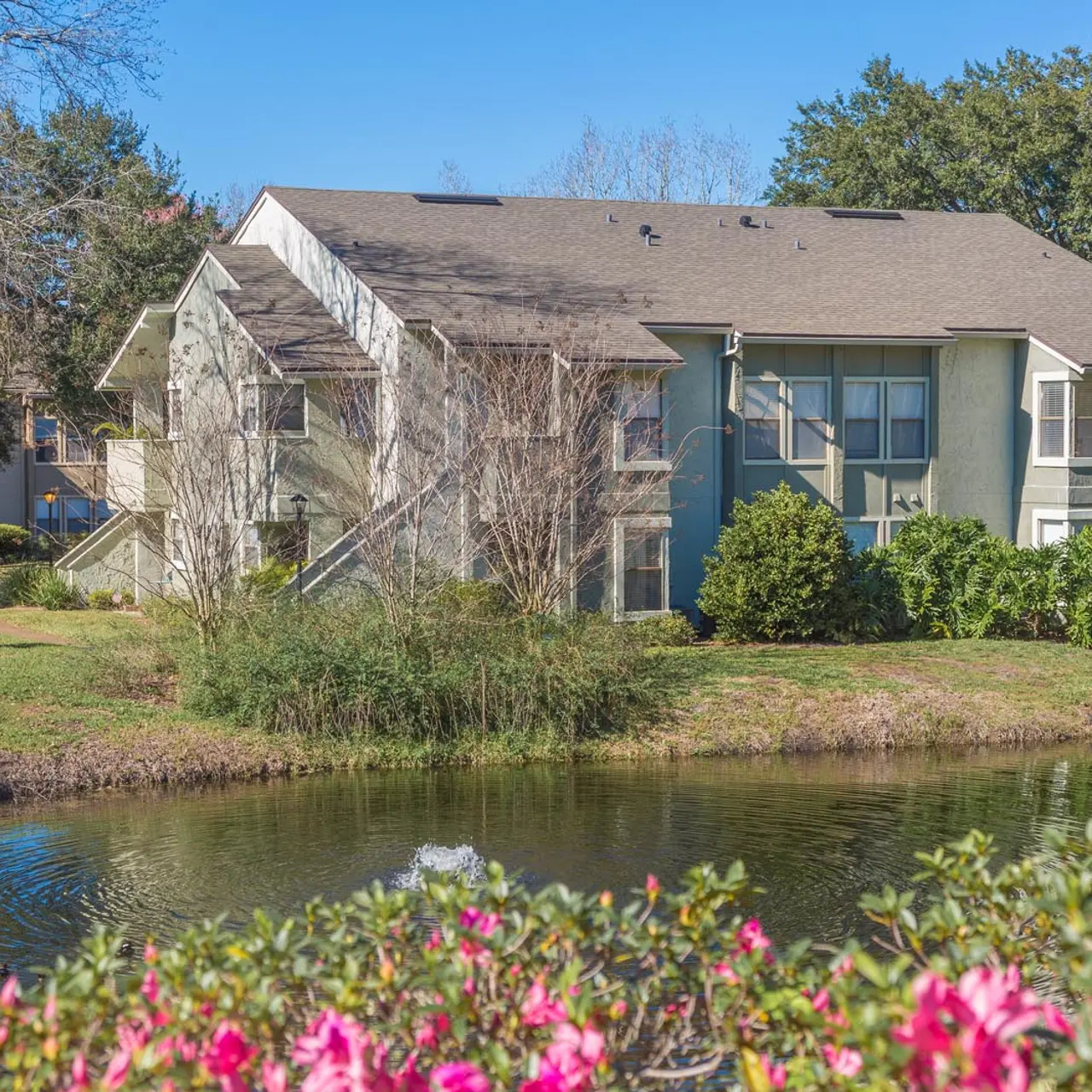 exterior of the property overlooking the pond
