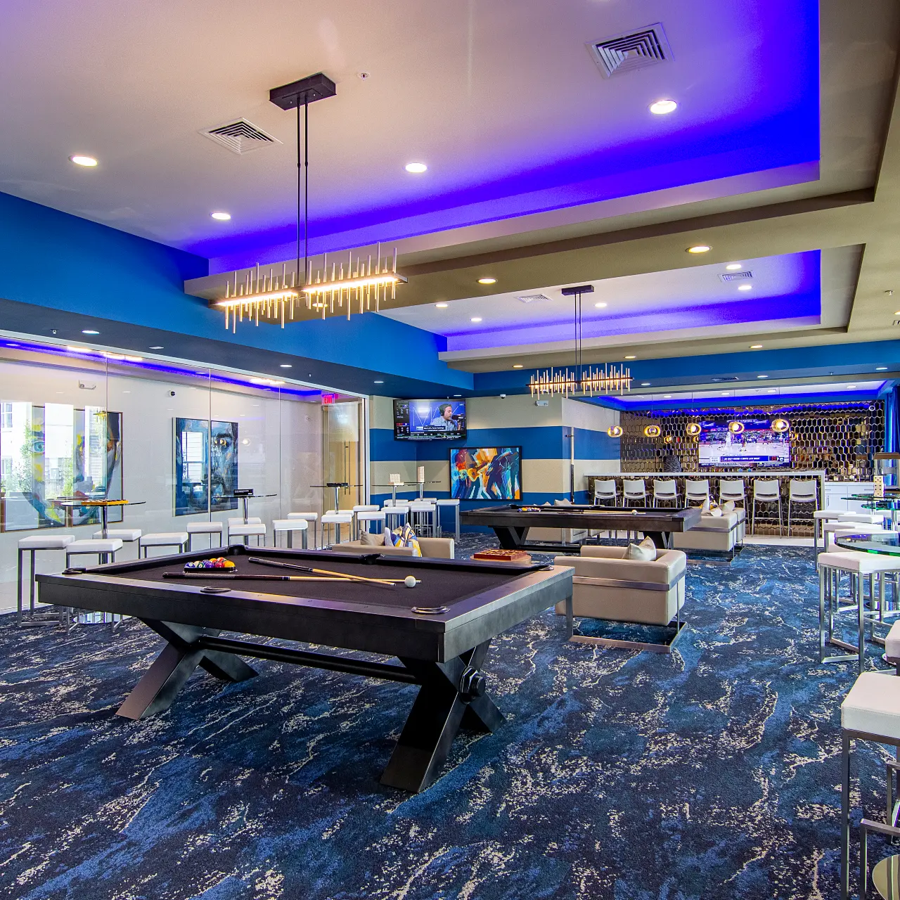 Billiards Lounge - The Pointe North Hills Photo of the pool tables and board games inside the Billiards Lounge at The Pointe North Hills.