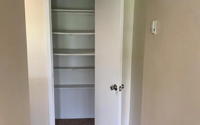 Langham Creek Apartments - Unit A Closet Langham Creek Apartments - Floor