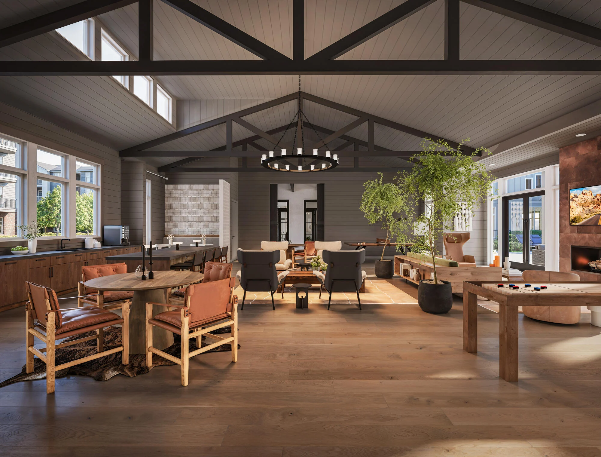 A spacious, modern living room featuring high ceilings with exposed beams, large windows allowing natural light, a combination of seating areas, and decorative plants.