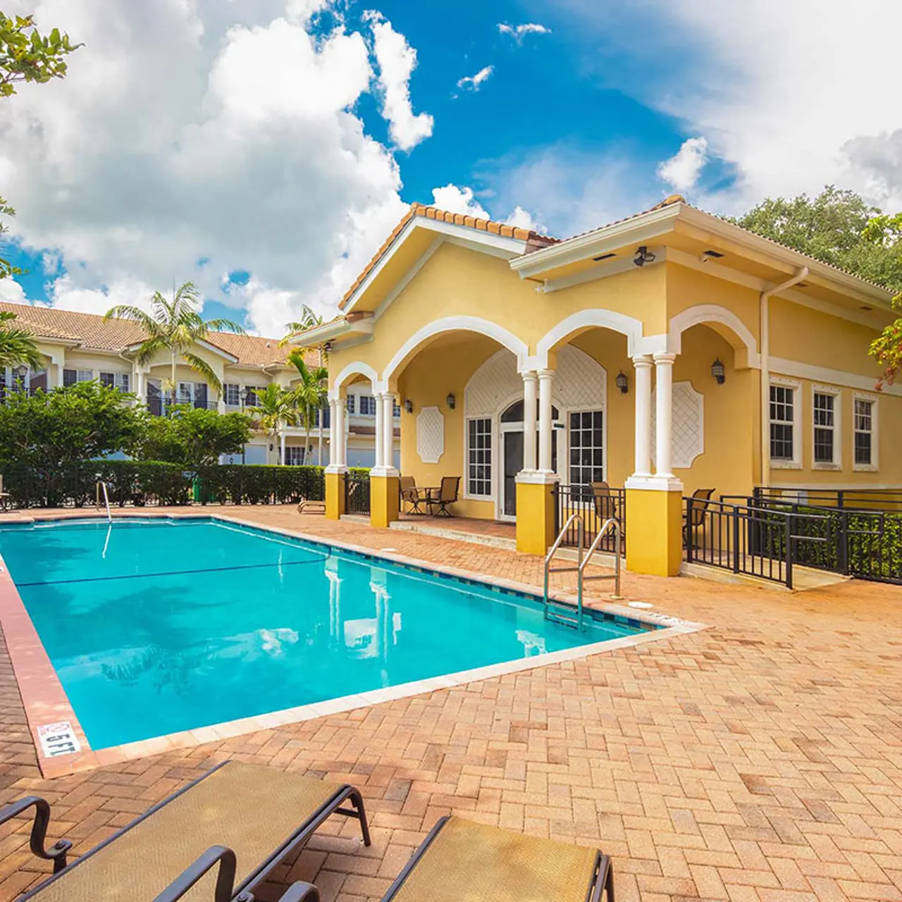 swimming pool with large pool deck