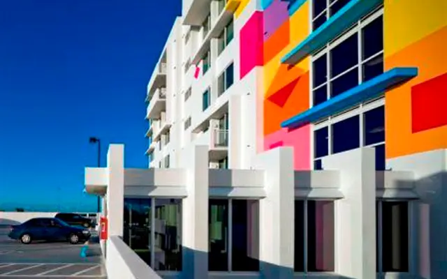 Vista Mar Apartments - Side View Entrance with Art Vista Mar Apartments - Side View Entrance with Art