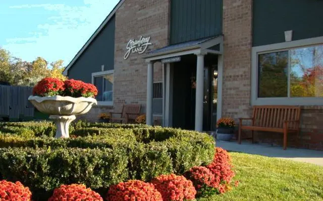 Strawberry Lane Apartments - Potted Plant, Grass, Bench