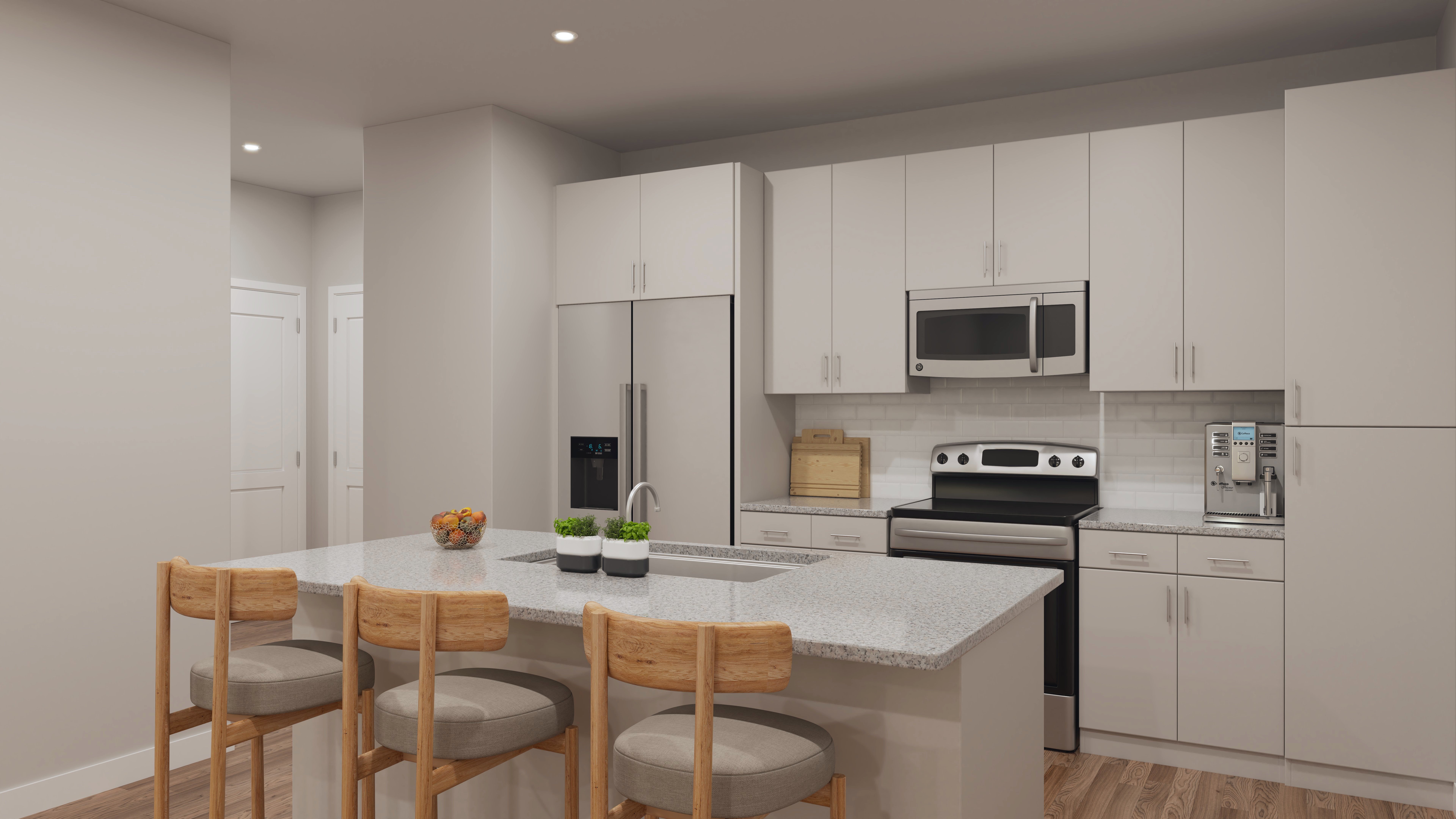 Modern Kitchen Interior A modern kitchen featuring light colored cabinetry, stainless steel appliances, and a large island with seating. The kitchen has a bright and clean look with wood flooring and neutral tones.