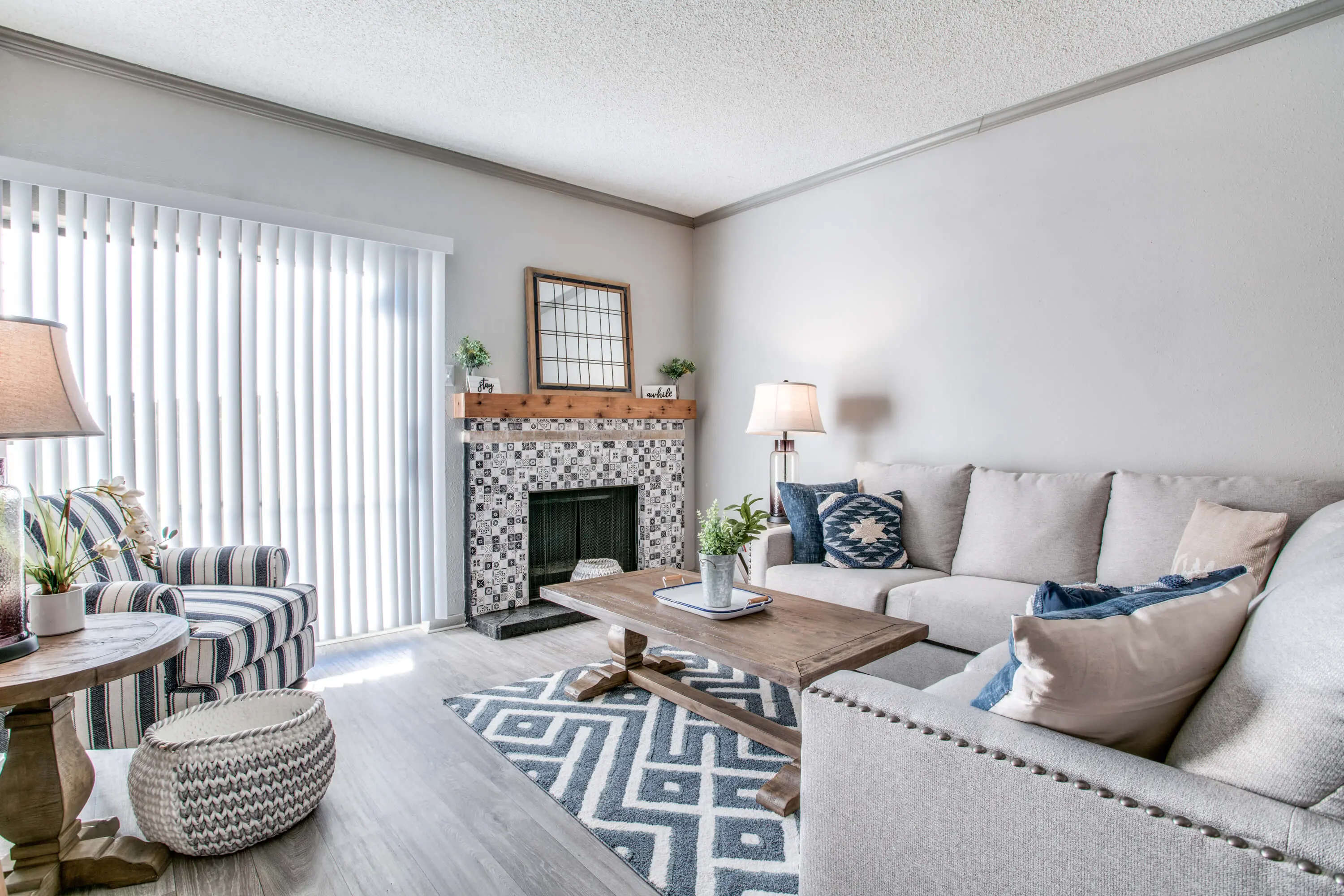 Living Room - Couch, fireplace, table, lamp