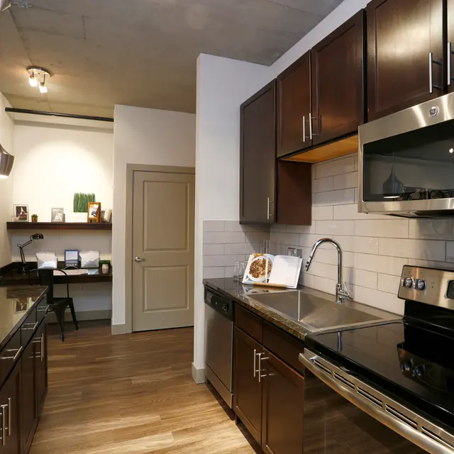 Kitchen with Stainless Steel Appliances, Granite Countertops and Kitchen Island