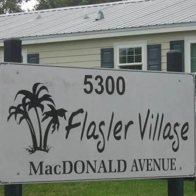 Flagler Village Apartments - Sign, Symbol