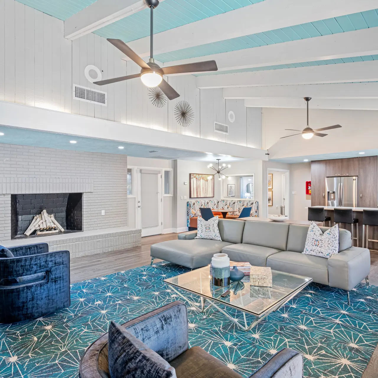 clubhouse with living area and a kitchen