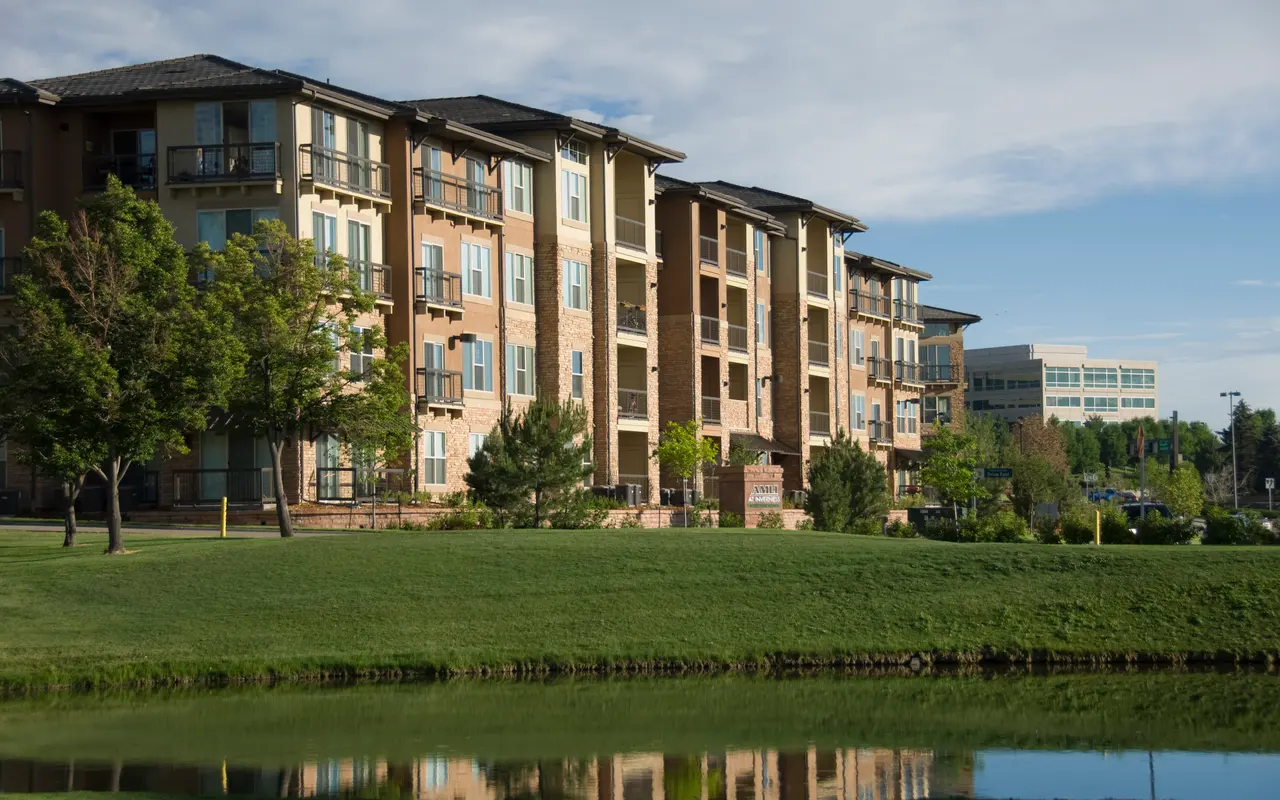 The Flats at Inverness The Flats at Inverness - City, Grass, Apartment Building