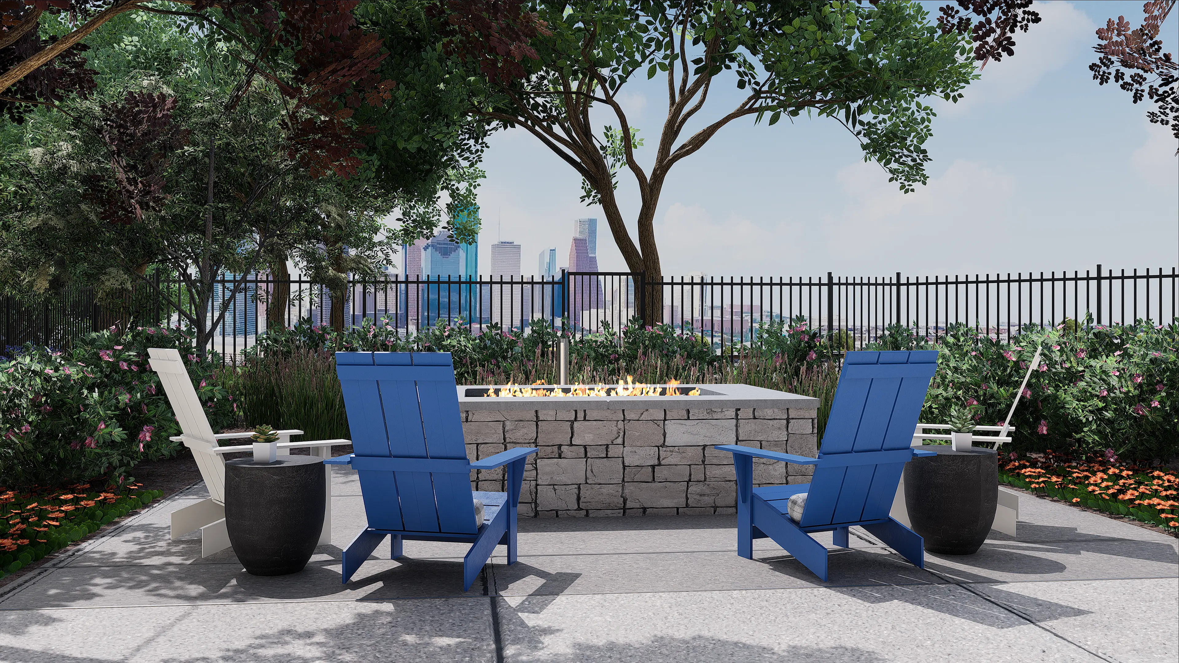 Standard on the River Lounge chairs circling a brick square fire-pit surrounded by trees looking out to the Houston skyline
