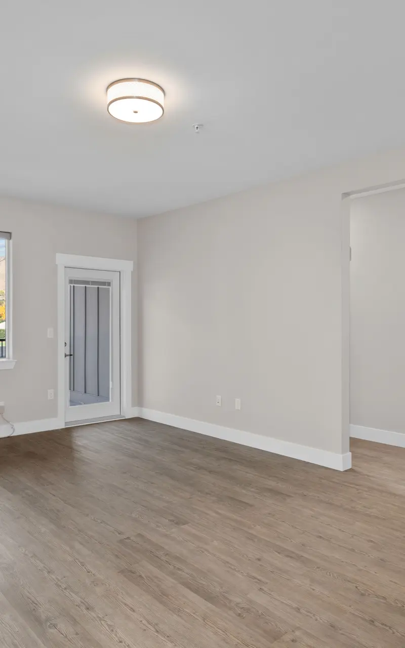 Room with beautiful wood flooring, showcasing a rich, warm finish and natural grain patterns that add a touch of elegance and warmth
