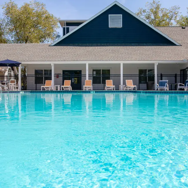 Resort-style swimming pool and sundeck at Centennial Crossing at Lenox Place