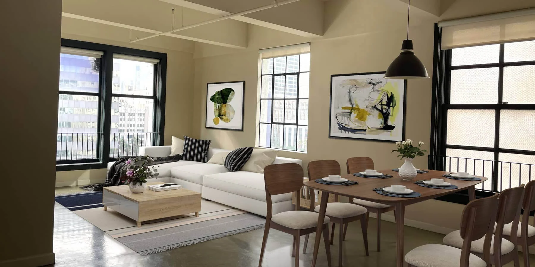 A modern apartment living room featuring a sectional sofa, a dining table set for meals, and large windows with city views.