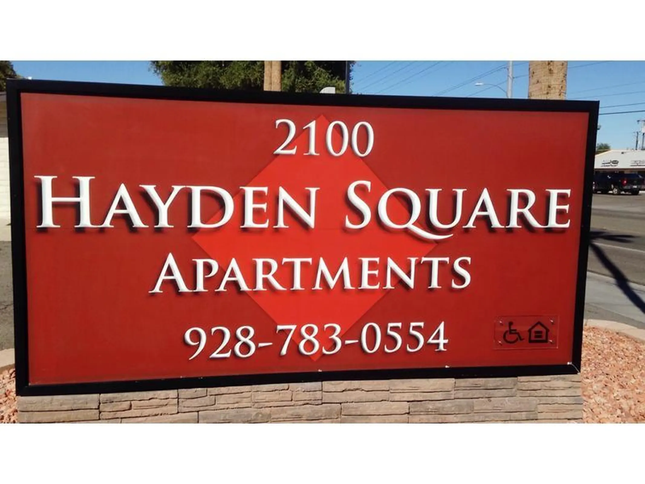 Hayden Square Apartments sign marked 2100, with the published leasing number.