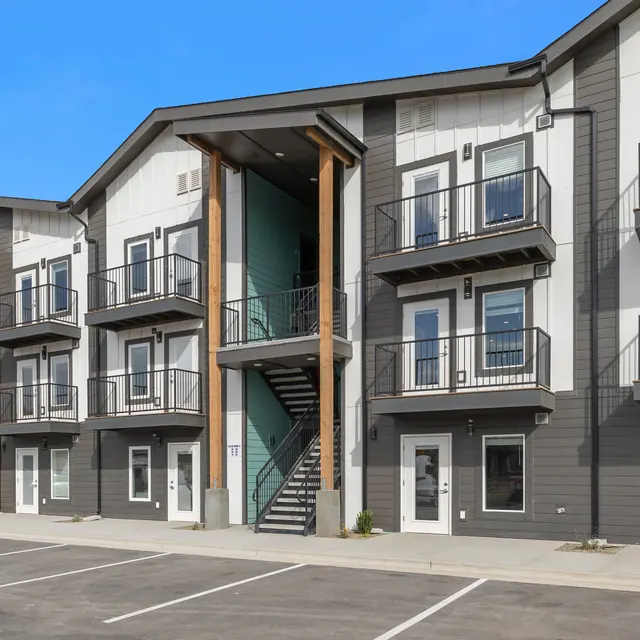 Modern Apartment Complex Modern apartment building with multiple floors and balconies