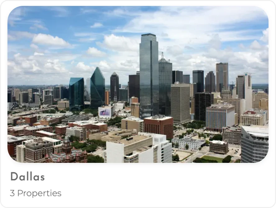 Dallas Cityscape A panoramic view of downtown Dallas featuring skyscrapers and a bright sky.