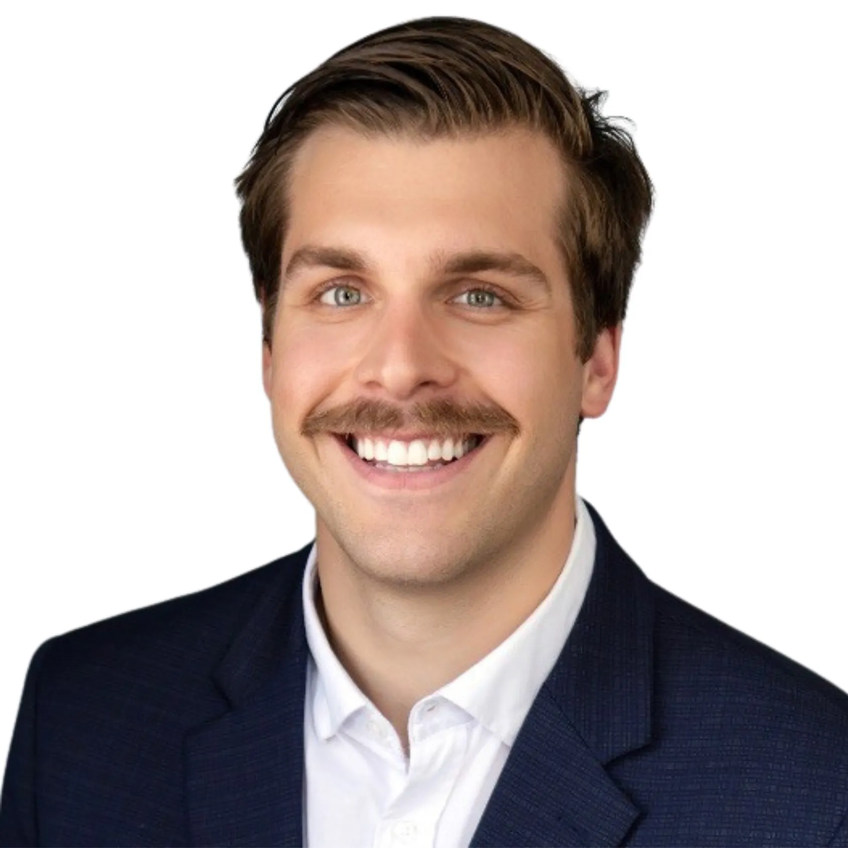 A smiling man with a mustache, wearing a suit and a white shirt, against a plain white background.