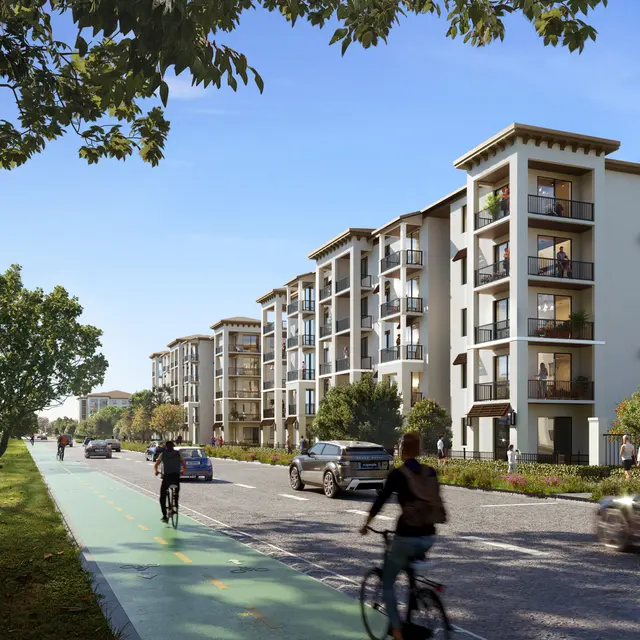 Rendering of a modern apartment complex with cyclists and vehicles on a street.