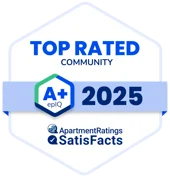 2025 badge indicating a top rated community with A+ epIQ rating from ApartmentRatings and SatisFacts.