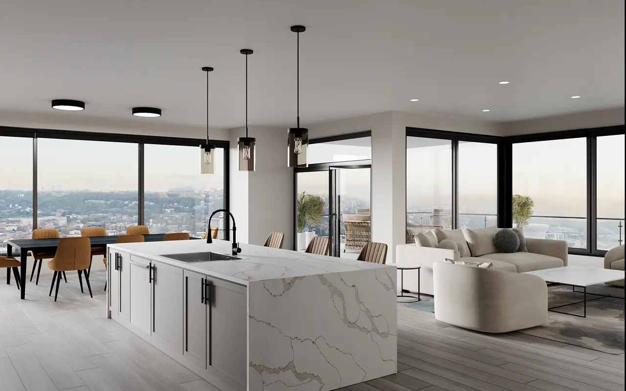 A modern open-concept kitchen and living area featuring a large island with a marble countertop, sleek cabinetry, and expansive windows offering a view of the cityscape. The living area includes a cozy sofa set and dining table, all with a contemporary design.