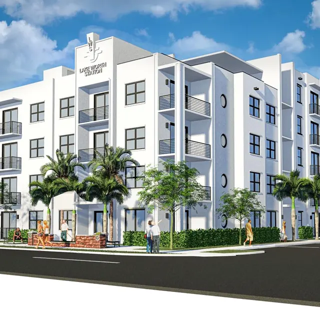 Rendering of a modern apartment building with a white exterior, large windows, and palm trees in front.