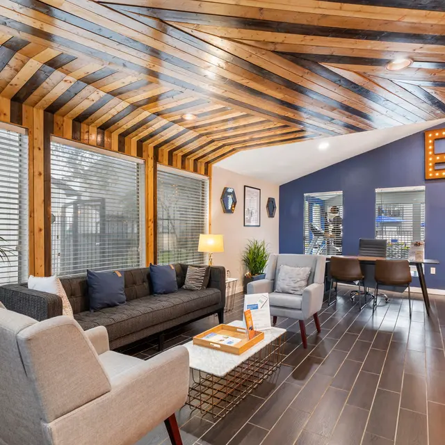 Modern Lobby Design A modern lobby space with wooden accents, cozy seating arrangements, and decorative lighting.