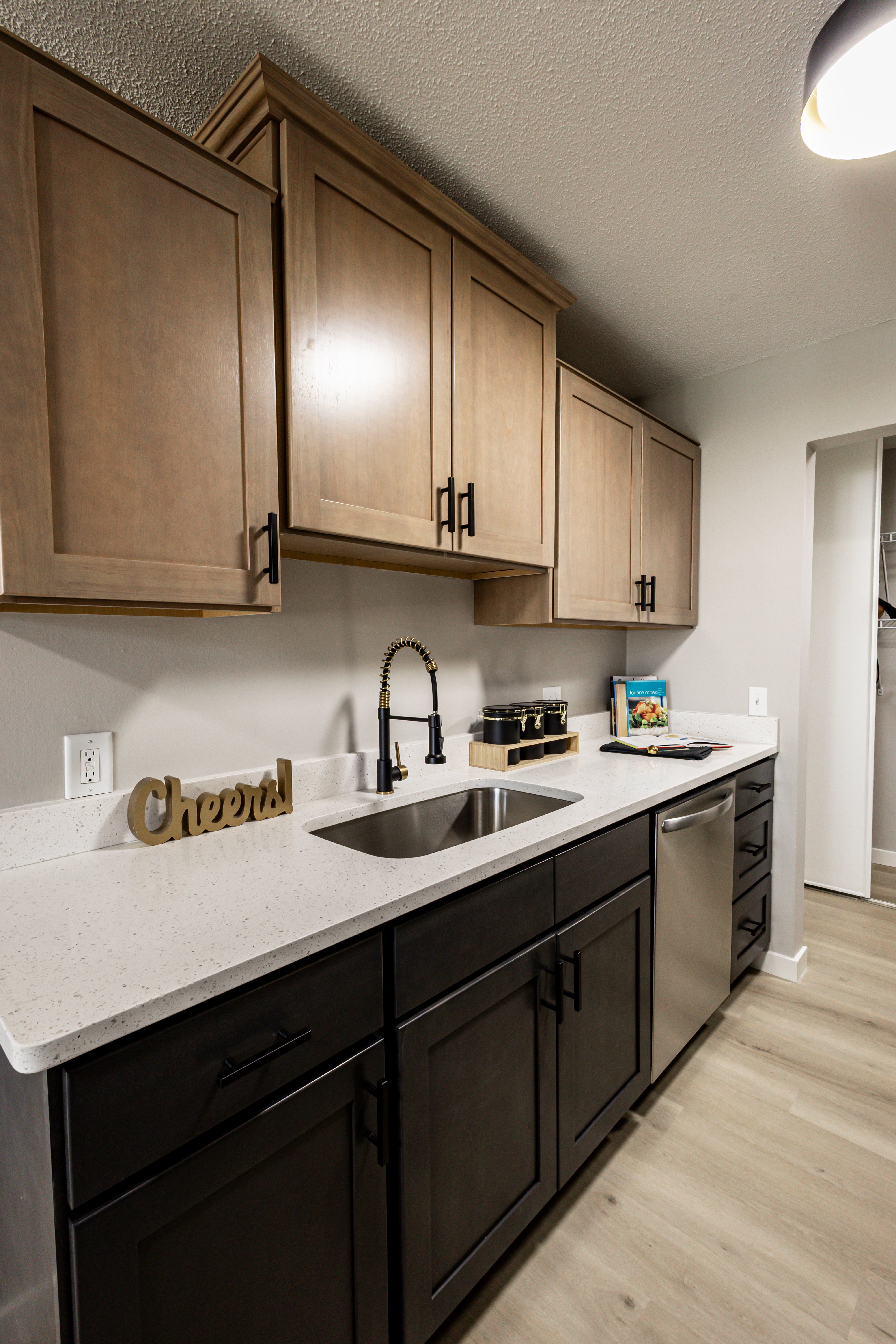 Modern Kitchen Design Interior view of a modern kitchen featuring wooden cabinets and stainless steel appliances.
