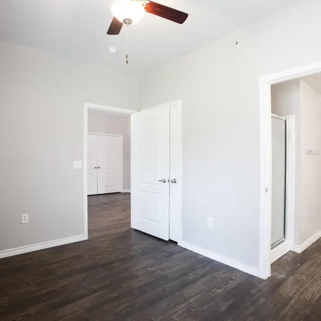 Willow 2x2 apartment homes featuring open-concept living spaces, modern kitchens, spacious bedrooms, and covered parking in a professionally maintained community