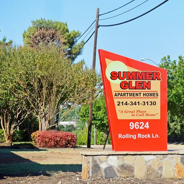 Sign for Summer Glen Apartment Homes, including contact number and address.