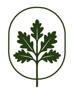 Stylized green leaf emblem inside an oval shape
