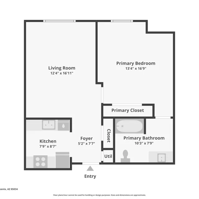 Apartment Floor Plan in Phoenix, AZ A floor plan layout of an apartment showing a living room, primary bedroom, kitchen, foyer, primary closet, and primary bathroom, with dimensions labeled.
