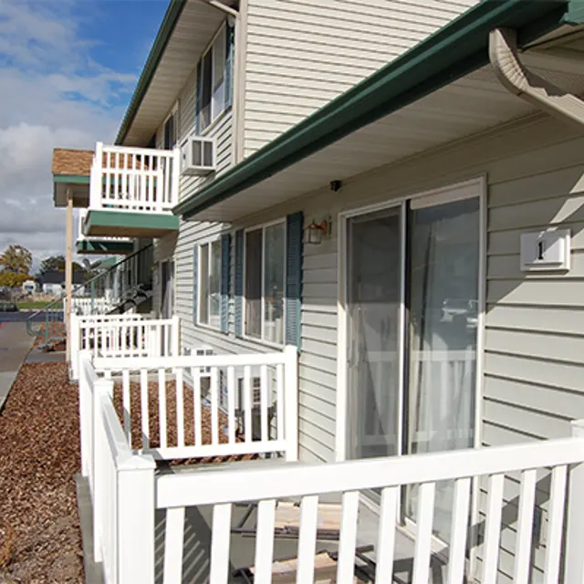 Apartment Building Exterior Appearance Exterior view of an apartment building with multiple balconies.